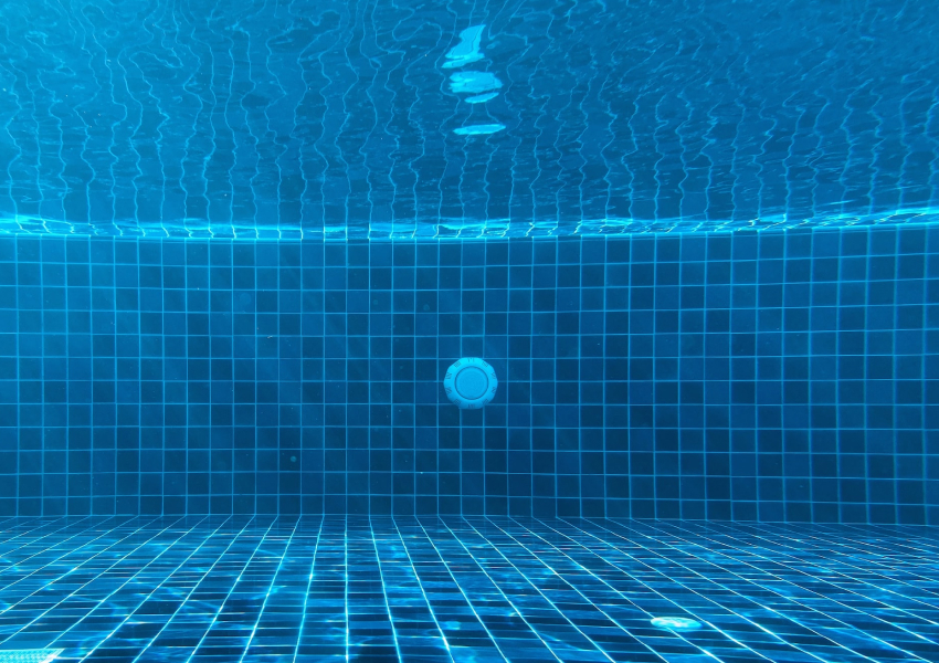 under the surface of the pool